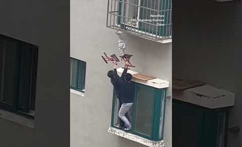 Neighbours rescue boy dangling from 4th-floor window in China #ytshorts